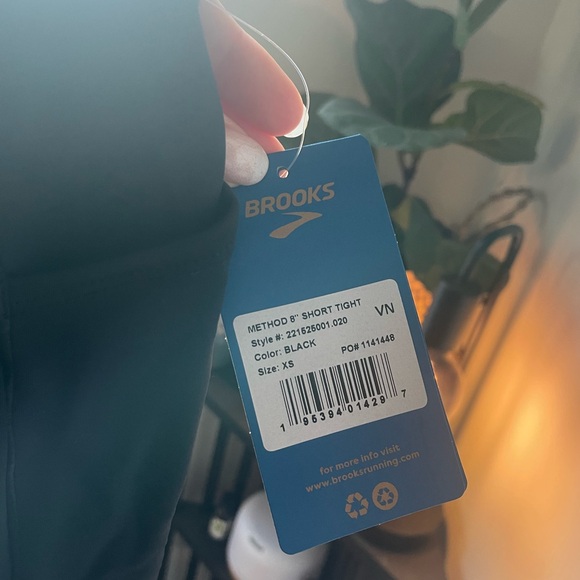 XS brooks 8 inch running shorts. Never worn. Tags still on. - Picture 3 of 4